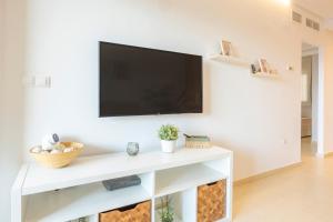 TV a/nebo společenská místnost v ubytování Paradise By Ej