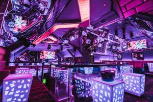 a nightclub with purple and pink lighting at The Vermont Hotel Newcastle in Newcastle upon Tyne