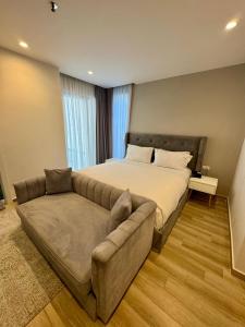Postel nebo postele na pokoji v ubytování Henry Resort & Spa