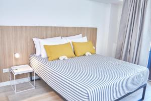 Up Recoleta Apartments客房内的一张或多张床位