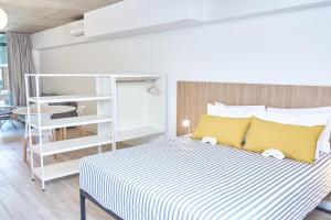 Up Recoleta Apartments客房内的一张或多张床位