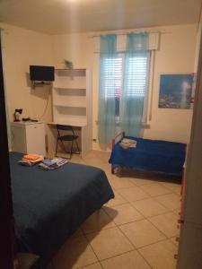Postel nebo postele na pokoji v ubytování San Marco