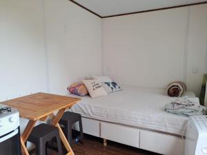 Postel nebo postele na pokoji v ubytování Monoambiente contenedor "Seles"