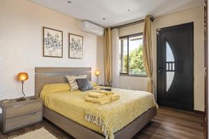 Postel nebo postele na pokoji v ubytování Cozy Apartments by Homie