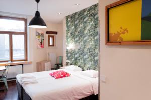 Postel nebo postele na pokoji v ubytování Hotel Finn