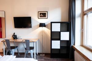 TV a/nebo společenská místnost v ubytování Hotel Finn