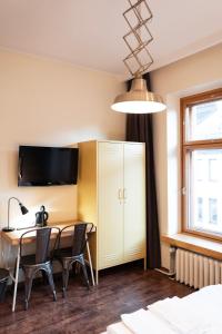 TV a/nebo společenská místnost v ubytování Hotel Finn