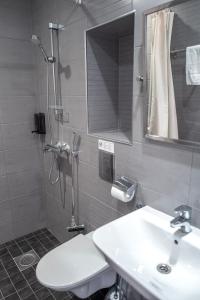 Koupelna v ubytování Hotel Finn