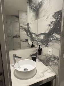 Et badeværelse på Appartement esprit chalet avec balcon centre La Clusaz + 17 billeder