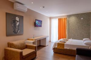 Postel nebo postele na pokoji v ubytování Lider Hotel