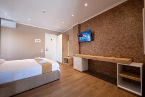 Postel nebo postele na pokoji v ubytování Lider Hotel