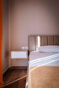 Postel nebo postele na pokoji v ubytování Lider Hotel