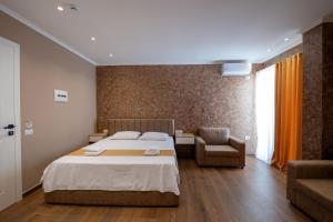 Postel nebo postele na pokoji v ubytování Lider Hotel