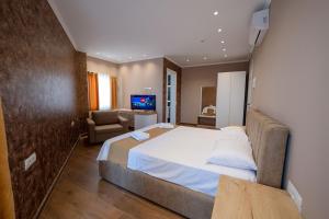 Postel nebo postele na pokoji v ubytování Lider Hotel + 37 fotografií
