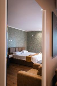 Postel nebo postele na pokoji v ubytování Lider Hotel