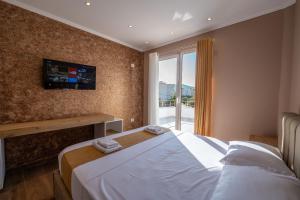 Postel nebo postele na pokoji v ubytování Lider Hotel