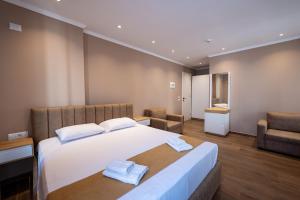 Postel nebo postele na pokoji v ubytování Lider Hotel