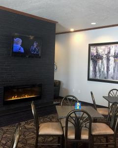A seating area at Expressway Suites Fargo