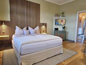 Giường trong phòng chung tại Ferienhof SchilfMeer - Fewo "Seepferdchen"