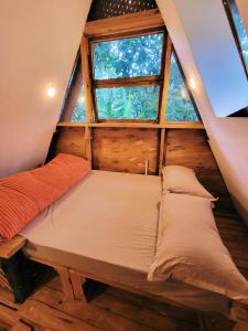 Katil atau katil-katil dalam bilik di Natural villa Arusha