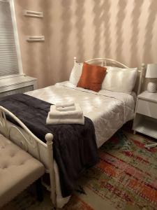 Postel nebo postele na pokoji v ubytování Cocoa Breeze Nook Suite