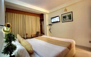Postel nebo postele na pokoji v ubytování Tara Home Shimla Near Mall Road