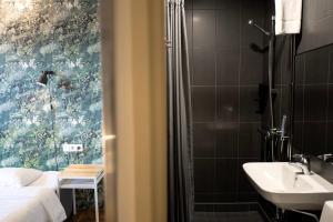 Koupelna v ubytování Hotel Finn