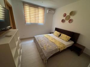 Ένα ή περισσότερα κρεβάτια σε δωμάτιο στο Apartment with sea view