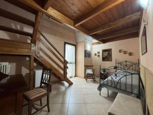 Postel nebo postele na pokoji v ubytování B&B La Corte