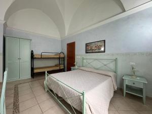 Postel nebo postele na pokoji v ubytování B&B La Corte