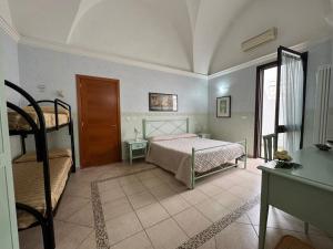 Postel nebo postele na pokoji v ubytování B&B La Corte