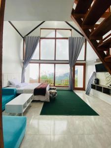 Posezení v ubytování Dieng cabin atas awan