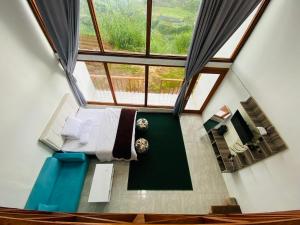 Posezení v ubytování Dieng cabin atas awan