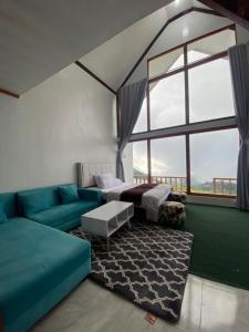 Posezení v ubytování Dieng cabin atas awan