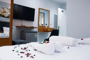 Voodi või voodid majutusasutuse Olivia Hotel toas
