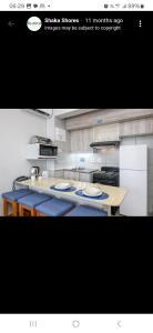 a kitchen with a counter with plates on it at Shaka Shores in Durban