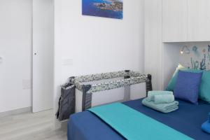 En eller flere senge i et værelse på Casa FriDe