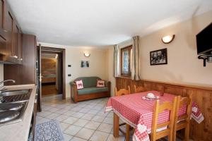 TV/trung tâm giải trí tại Maison Godioz - Appartamento 1