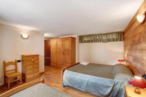 Giường trong phòng chung tại Maison Godioz - Appartamento 1 +10 ảnh