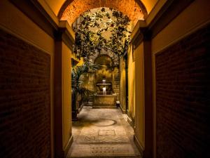 a hallway in a building with a ceiling at Deluxe Ripetta 41 in Rome