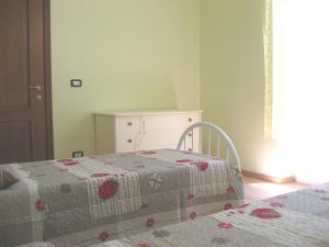 Posteľ alebo postele v izbe v ubytovaní Casa Bruno B&B