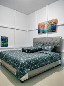 Postel nebo postele na pokoji v ubytování TM guest house 2