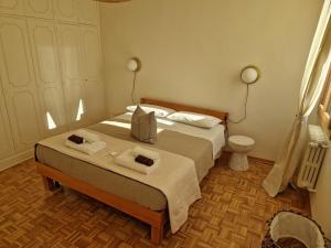Postel nebo postele na pokoji v ubytování Residenza La Veranda a Rialto