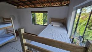 Postel nebo postele na pokoji v ubytování LahSelva Pousada e Hostel
