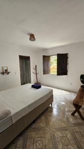 Postel nebo postele na pokoji v ubytování LahSelva Pousada e Hostel