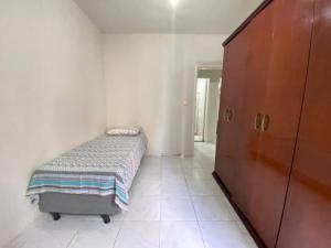 Postel nebo postele na pokoji v ubytování Apartamento Mobiliado com 3 Quartos, sendo 1 suíte + 1 fotografie