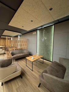 Posezení v ubytování Hotel Alpen
