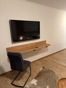 TV a/nebo společenská místnost v ubytování Apartment Haus am See