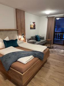 Postel nebo postele na pokoji v ubytování Apartment Haus am See