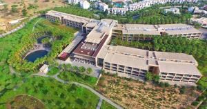 an overhead view of a building with a garden at Kimpton Atlantico Algarve by IHG in Albufeira